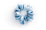 Load image into Gallery viewer, Sky blue 100% mulberry silk scrunchie for anti frizz, anti breakage, hair benefits. Celebrates the wonder of natural hair by providing superior quality, professional hair products for women to achieve healthy, long, strong natural hair. made in toronto. 
