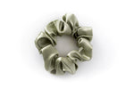 Load image into Gallery viewer, Sage green 100% mulberry silk scrunchie for anti frizz, anti breakage, hair benefits. Celebrates the wonder of natural hair by providing superior quality, professional hair products for women to achieve healthy, long, strong natural hair. Made in Toronto. 
